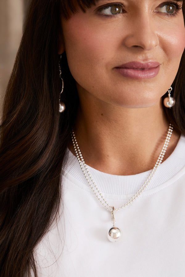 Klas Silver Orbit Pendant Necklace on model