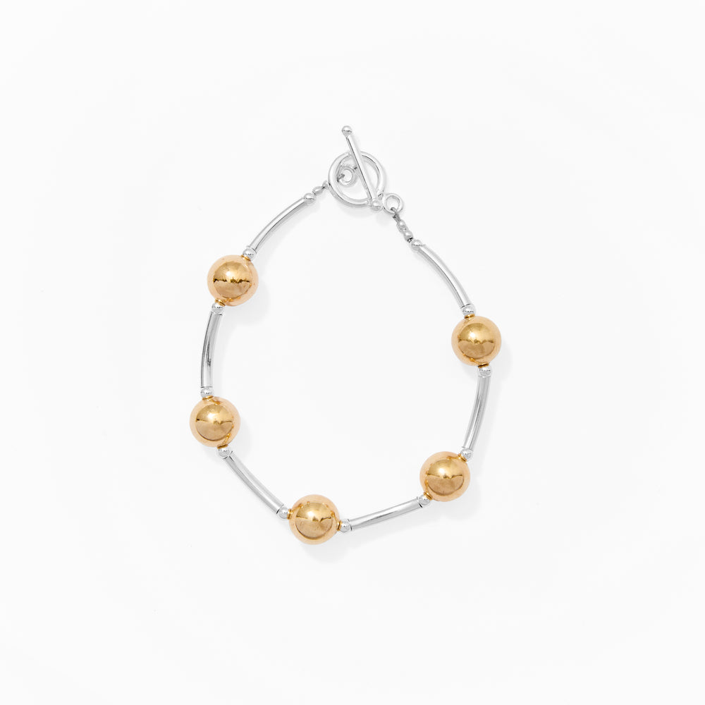 Klas Curves Gold Bracelet on white background