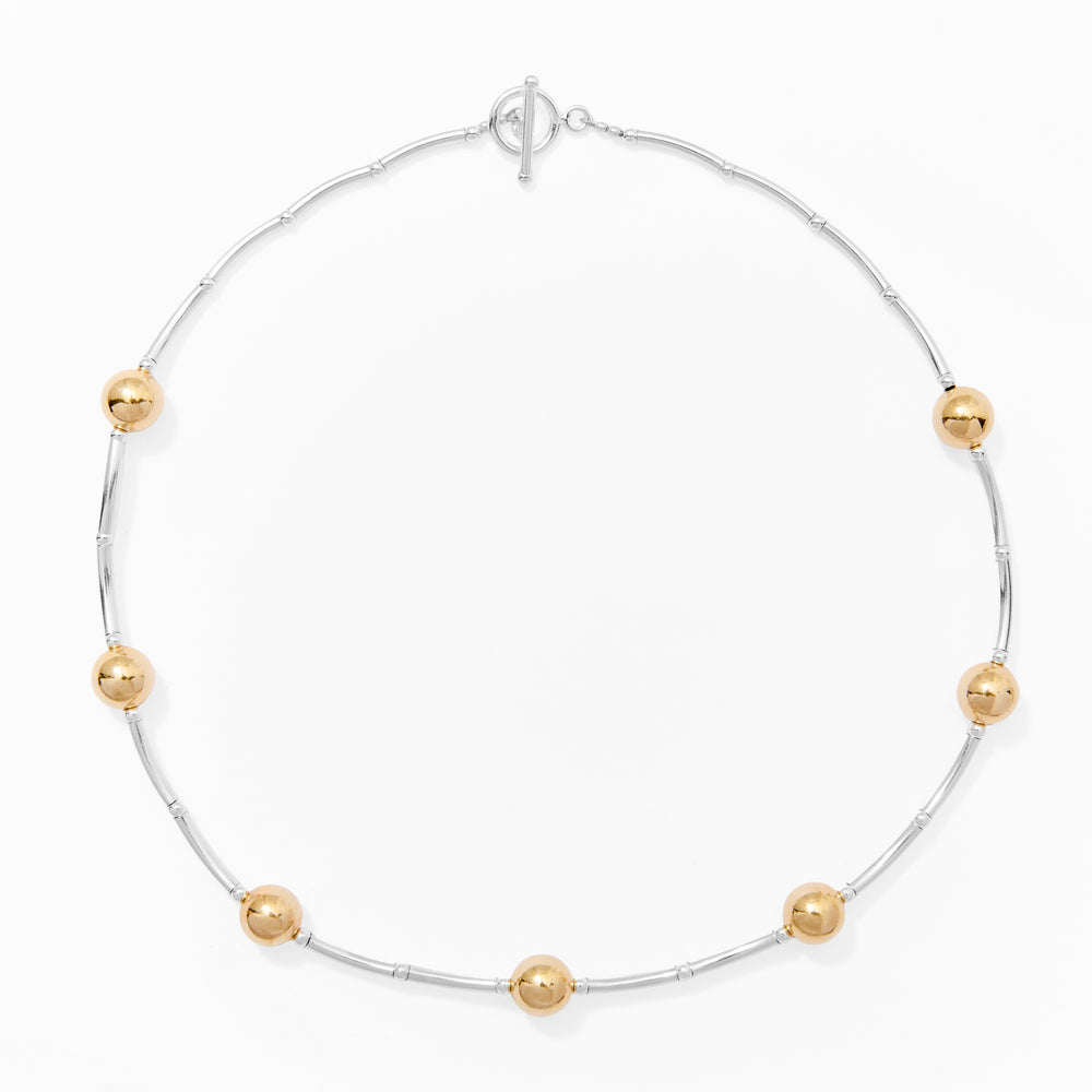 Klas Curves Gold Necklace on white background