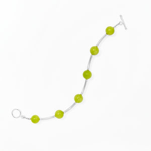 Klas Juicy Curve Bracelet in Zest on white background
