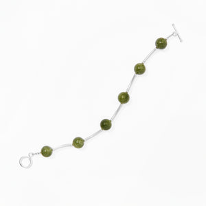 Klas Juicy Curve Bracelet in Evergreen on white background