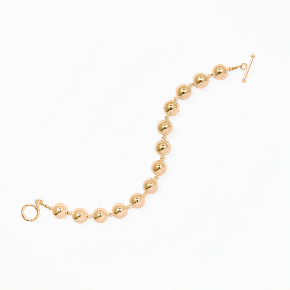 Klas Gold Bracelet on white background